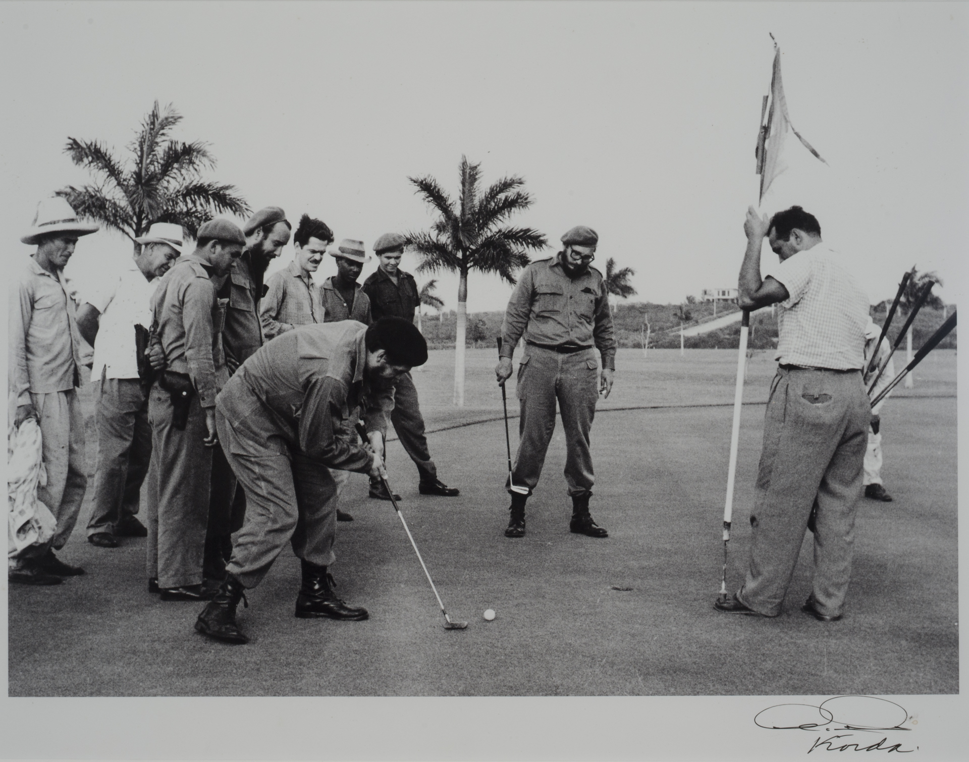 Che Guevara playing golf with Fidel Castro by Korda (1959)